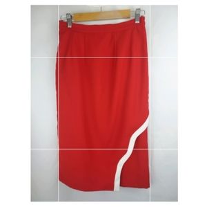 Vintage, red, pencil skirt with asymmetrical side slit "ruffle."